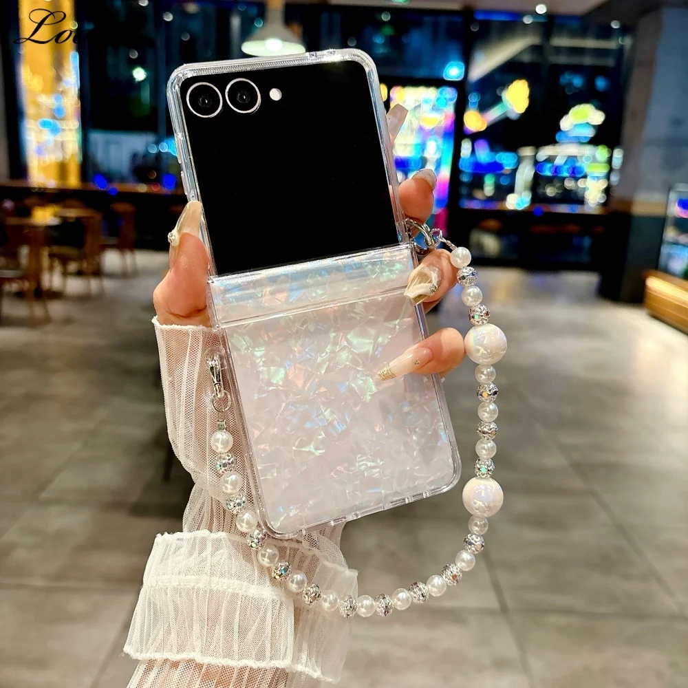 Galaxy Z Flip7: Luxuriöses Muschelmuster-Perlenarmband-Etui Flip Handgelenkskette Acryl-Hartschale