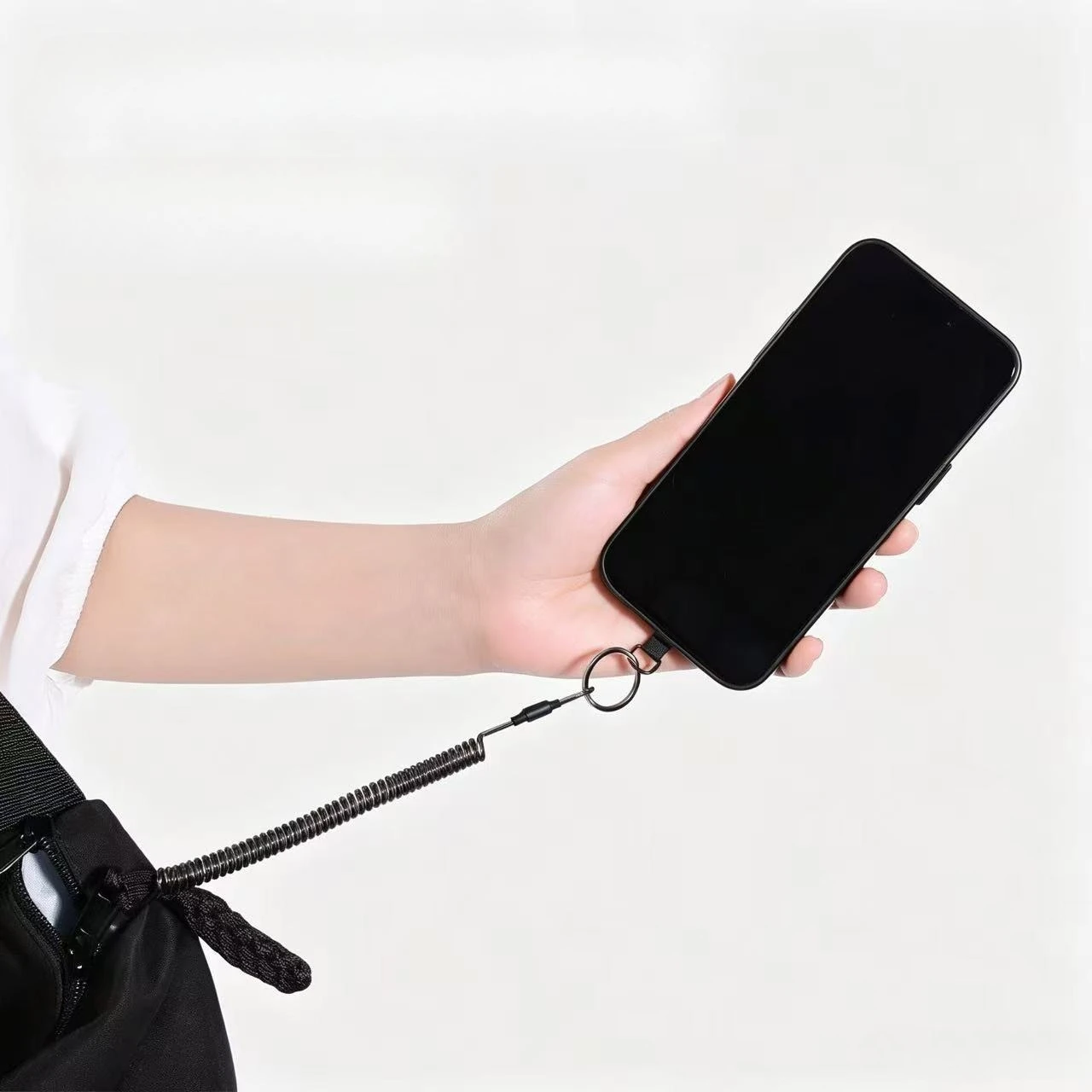 Diebstahlsichere Feder-Handyriemen mit Befestigungslaschen und Schnellverschluss-Schnalle – Sicheres Werkzeug für iPhone & Mi – Bild 3