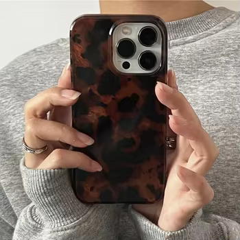 iPhone 16: Retro-Bernstein-Textur-Laser-Telefonhülle Stilvolle weiche Abdeckung mit Leopardenmuster