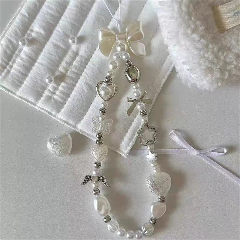 Perlen-Handyketten-Charm-Lanyard für iPhone Samsung, niedliche barocke weiße Schleife, Blumen-Charm, universelles Zubehör, Schmuckanhänger – Bild 2